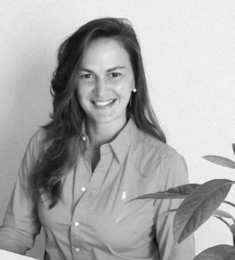 Irina Mrozinski, founder of HappierMe.Today and certified positive psychology coach, smiling warmly and embodying mindful living and authentic resourcefulness.