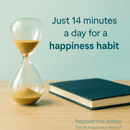 A 14-minute sand hourglass placed beside a journal — symbolising the 1% Daily Happiness Habit and the emotional resilience tools introduced in Phase 2 of the 1% Happier Me Today workbook.