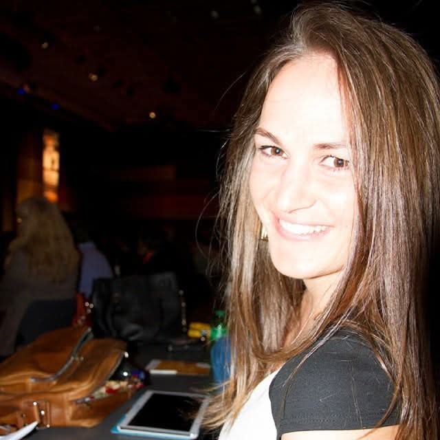 Confident woman after attending a personal development seminar — symbolising early stages of the emotional resilience journey and the power of cognitive reframing.